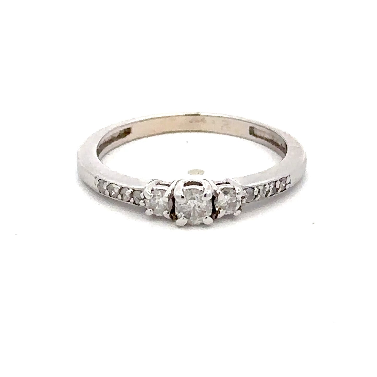 14kt white gold three stone diamond ring