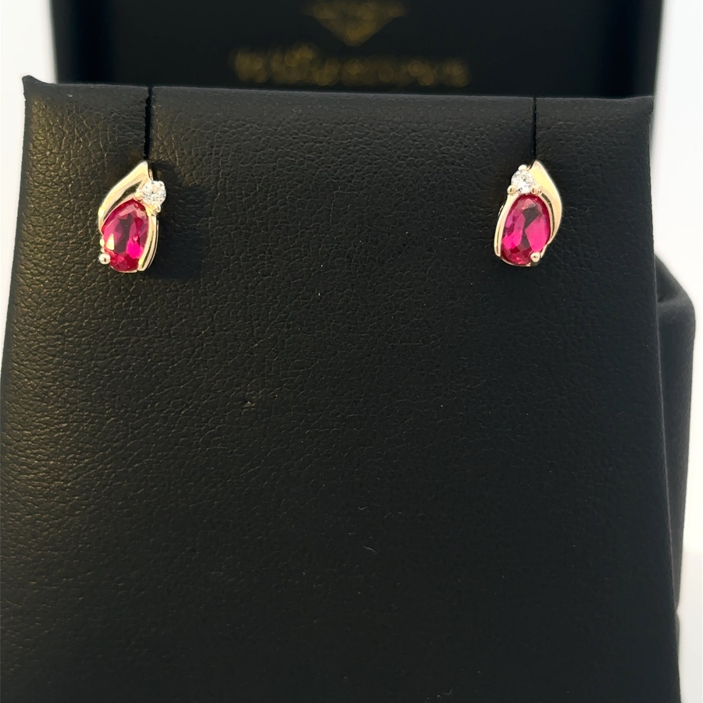 14kt yellow gold stud earrings vintage red stone and CZ