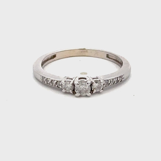 14kt white gold three stone diamond ring